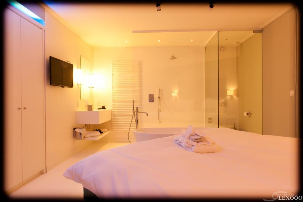 Vixx Suites Mechelen Rum bild