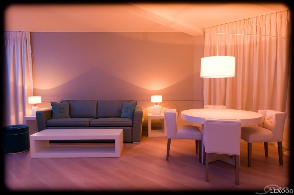Vixx Suites Mechelen Rum bild