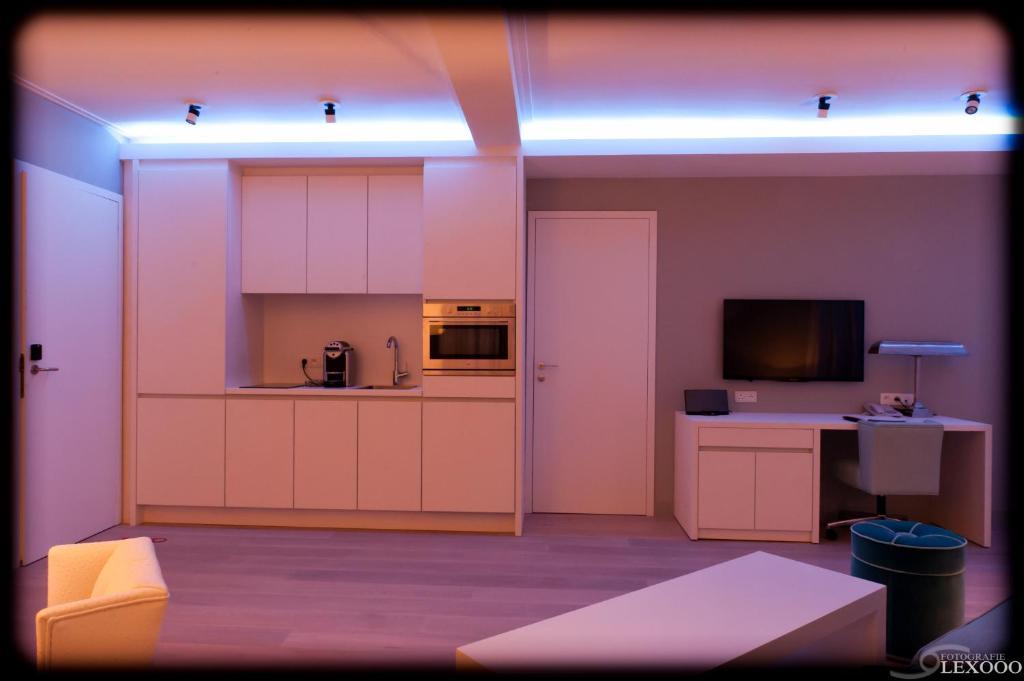 Vixx Suites Mechelen Rum bild