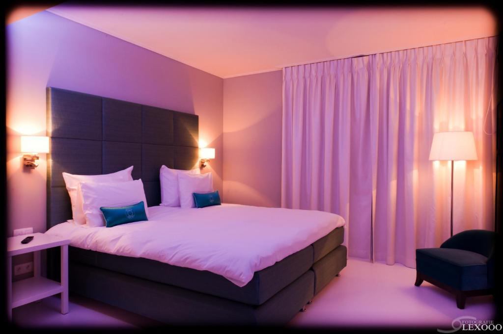 Vixx Suites Mechelen Rum bild