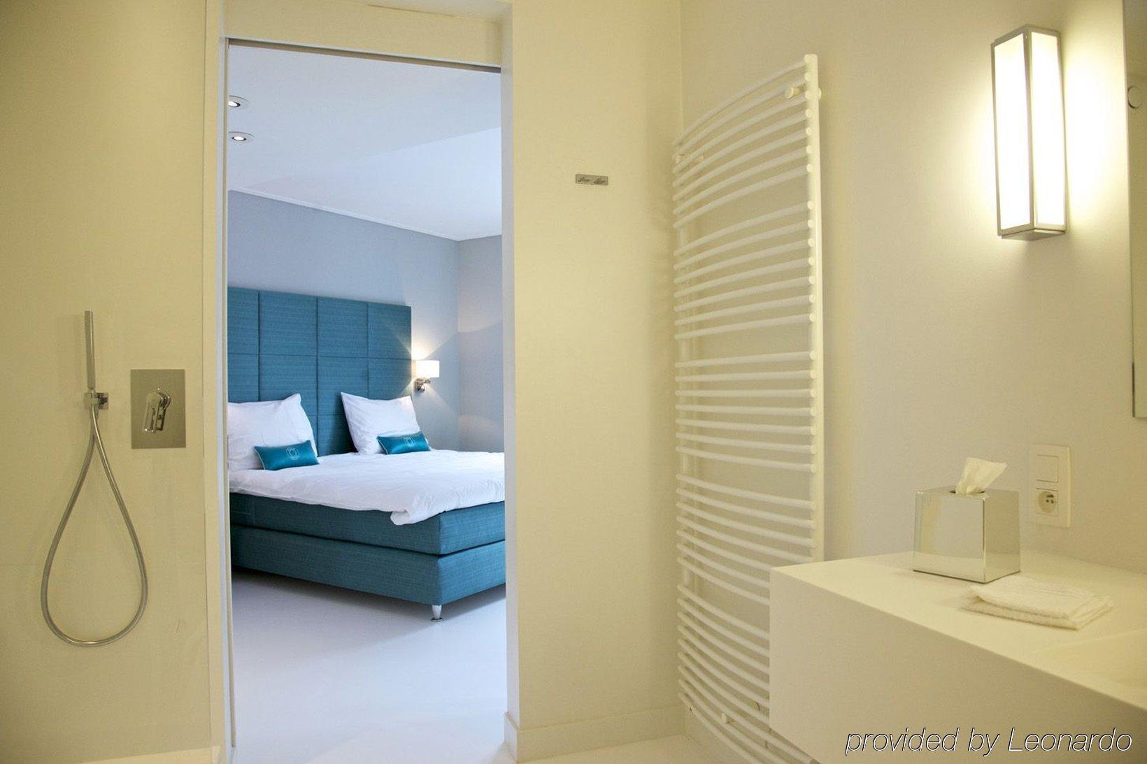 Vixx Suites Mechelen Rum bild